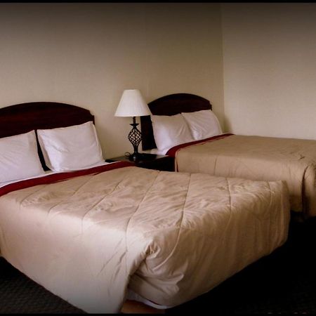 Guest Inn Rogers Pokoj fotografie